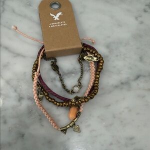 American Eagle Outfitters Pink and Bronze Multi-Strand Charm Bracelet Set